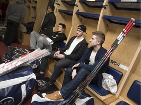 Windsor Spitfire players hang out in the dressing room after the conclusion of the team's season at the WFCU Centre, Saturday, April 2, 2016.