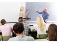 Teacher and students in classroom session. Photo by fotolia.com.