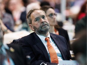 Federal NDP leader Thomas Mulcair listens to a speaker during the 2016 NDP Federal Convention in Edmonton on Saturday, April 9, 2016.