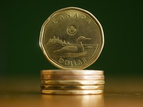 The Canadian dollar continued its slide on the market Wednesday.