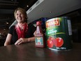 Michelle Nesbitt  is displays Primo ketchup which is served at Jose's Bar and Grill in Windsor on Wednesday, April 13, 2016. The restaurant switched to Primo ketchup after Heinz pulled out of Leamington.