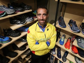 Ryan Allison is photographed at the Running Factory in Windsor on Tuesday, April 19, 2016.                Allison ran three races at the same time and won all three.