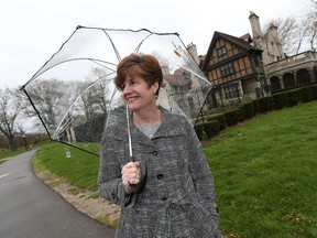 Art in the Park board chair Colleen Mitchell stands in Willistead Park in Windsor on Thursday, April 28, 2016. The festival is embracing their wet weather reputation with rain or shine umbrellas.