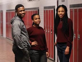 Catholic Central ESL students Godson Dugazon, Cassandre Dugazon and Alexandra Estimable (left to right) are learning english while taking a co-op course offered through their school in Windsor on Tuesday, March 29, 2016.