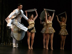 Justan Myers, left, as Billy, performs with ensemble dancers during St. Clair College production of 42nd Street on April 6, 2016.
