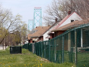 The Ambassador Bridge is seen in west Windsor, Ont. on April 20, 2016.  Abandoned homes remain on Indian Road and several west end streets near the bridge.
