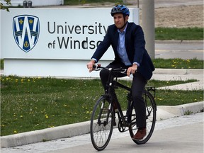 Christopher Waters, dean of Faculty of Law at University of Windsor, routinely takes his bicycle to work and to make appointments downtown.