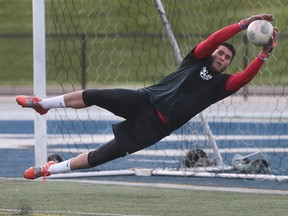The Windsor Stars soccer team held its final practice on Wednesday, April 27, 2016, before kicking off the season this upcoming Sunday. Goalkeeper Kyle Vizirakis makes a diving save during practice at the University of Windsor Alumni Stadium.
