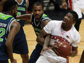 Niagara River Lions Sam Muldrow, left, and B.J. Monteiro defend Windsor Express Shaquile Keith in NBL Canada playoffs at WFCU Centre May 2, 2016.