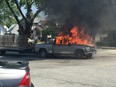 A truck is engulfed in flames on Tecumseh Road East in Windsor on May 25, 2016. (Xavier King/Special to The Star)