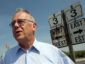 Former MPP Bruce Crozier is pictured along Highway 3 in Essex in this 2007 file photo.