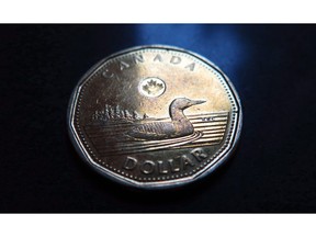 Loonie falls as markets react to Trump talk on tariffs.