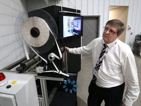 John Stubbs, General Manager of Caxton mark Inc. talks about the new merger between Caxton mark Inc, and MGI during media event on May 10, 2016 in Leamington, Ont.