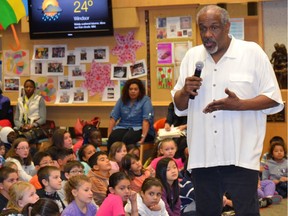 Children's author Christopher Paul Curtis speaks to school children on May 11, 2016, at the Windsor Public Library, encouraging them to write and illustrate their own books.