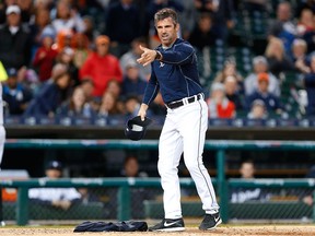 Detroit Tigers manager Brad Ausmus yells at home plate umpire Doug Eddings after laying his sweatshirt on home plate against the Minnesota Twins in the fourth inning of a baseball game Monday, May 16, 2016 in Detroit. Ausmus was thrown out of the game
