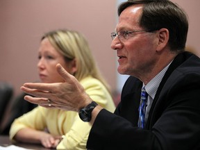 Kristy McBeth, director of Knowledge Management, and Dr. Gary Kirk, CEO and medical officer of health, (right) address council during a regular council meeting at city hall in Windsor on Monday, May 2, 2016.