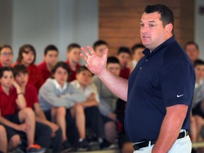 D.J. Smith, assistant coach of Toronto Maple Leafs and former Windsor Spitfires assistant coach, speaks to staff and students at the F.J. Brennan Centre of Excellence and Innovation on Thursday, May 19, 2016.