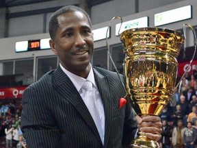 Windsor Express president and CEO Dartis Willis is shown with the league's championship trophy. Willis has been named NBL executive of the year.