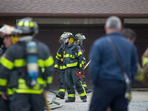 Windsor fire crews extinguish a blaze at 1290 Jefferson Blvd., on Saturday, May 14, 2016.