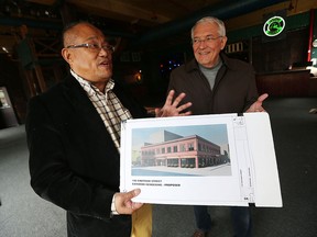 Henry Tam and Jim Williams (right) discuss plans for the former Fish Market in Windsor on Tuesday, May 10, 2016. Tam is hoping to have his food court concept up and running in as little as four months.