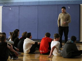 Danny Berman brings the Tour For Humanity to students at Holy Cross Catholic Elementary School in Windsor on Tuesday, May 10, 2016.