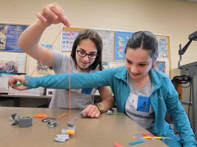 Tecumseh Vista Academy students Maja Jelich, 13, (L) and Milica Paunic, 14,  participate in the Let's Talk Science Challenge on Friday, May 13, 2016 at the University of Windsor.
