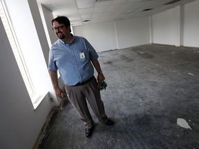 Ron Dunn, executive director of the Downtown Mission, leads a tour of their new building at 875 Ouellette Avenue in Windsor on Monday, May 2, 2016. The mission will use the building to offer several programs as well as lease space to other tenants.