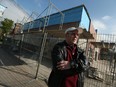 Terrence Kennedy is photographed in front of a new brick wall in Sandwich in Windsor on Wednesday, May 11, 2016. Kennedy is upset with the buildings owed for covering a mural.