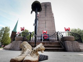 A soldier's cross is seen at the Cenotaph in downtown Windsor, Ont. on May 9, 2016. The helmet, rifle and boots form a battle cross and were on display for the  National Day of Honour for persons in the  Canadian Armed Forces who served in Canada's mission in Afghanistan.