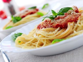 Plates of pasta and tomato sauce are pictured in this handout