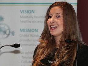 Ashley Vodarek, a team assistant of fund development and community relations for Canadian Mental Health Association Windsor-Essex County, speaks at a media conference on Tuesday, May 3, 2016, at the Windsor Star News Cafe.