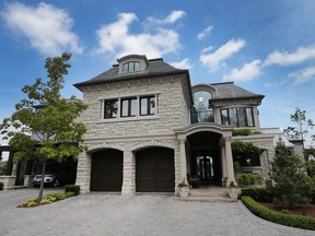 With an asking price of $5,995,000 million this home at 5656 Riverside Dr. E. in Windsor, ON. is one of a kind. The front of the home is shown on Thursday, May 26, 2016.