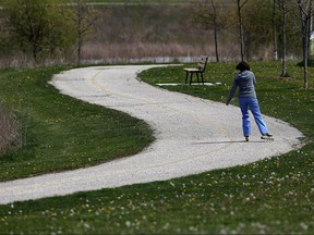 A woman chats on the phone while rollerblading on a beautiful day in Windsor on Monday, May 9, 2016.