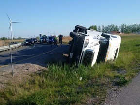 OPP at the scene of a rollover involving a tractor trailer hauling watermelons on Highway 401 near Tilbury on May 23, 2016.