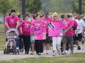 People participate in the CARSTAR Walk to Make Cystic Fibrosis History at the Vollmer Recreation Complex in LaSalle, Sunday, May 29, 2016.