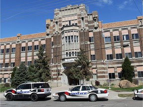 Windsor police are shown at Walkerville Collegiate Institute on April 24, 2014, after a lockdown was issued due to a threat made on Twitter.