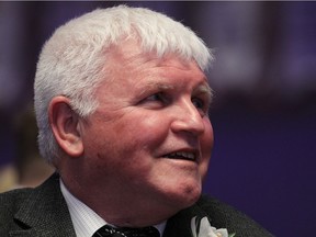 Dennis Fairall listens to speeches in his honour during a party for the University of Windsor Lancers coach at Caesars Windsor on Feb. 25, 2016.