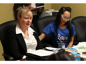 WINDSOR, ON. MAY 13, 2016. -- Parents Mary Beth Rocheleau and Tina Kennedy (right) share their stories during a round table event at the office of MPP Lisa Gretzky in Windsor on Friday, May 13, 2016. The group discussed provincial funding of autism programs.                     (TYLER BROWNBRIDGE / WINDSOR STAR)