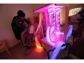 Alina Sirbu (left) brings resident Anna Sadler in to the Snoezelen Room at Huron Lodge in Windsor on Thursday, May 19, 2016. Several programs are leading to reduction in drugs for patients with dementia.                         (TYLER BROWNBRIDGE / WINDSOR STAR)