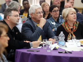 Unifor Local 444 president Dino Chiodo, left, auto adviser Ray Tanguay and Deputy Premier Deb Matthews listen to automotive experts during the Windsor Essex Regional Chamber of Commerce  Policy & Solutions forum held at the Caboto Club on May 11, 2016.