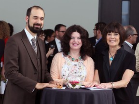 Composer and jazz musician Michael Karloff, left, joined St. Clair College president Patti France and Windsor Endowment for the Arts President Carolyne Rourke, right, at the Windsor Endowment for Arts Awards at the Art Gallery of Windsor and Chimczuk Museum Thursday May 12, 2016.