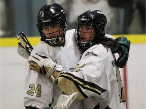 Windsor Clippers Blain Wallace and Andrew Garant celebrate a goal against the Point Edward Pacers during Ontario Junior B Lacrosse action game at Forest Glade Arena.