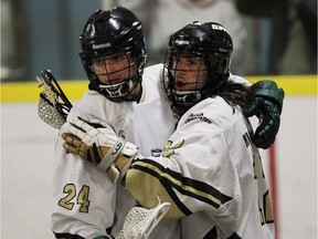 Windsor Clippers Blain Wallace and Andrew Garant celebrate a second period goal against the Point Edward Pacers during Ontario Junior B Lacrosse action on May 13, 2015 at Forest Glade Arena.