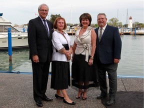 Tony and Peg Haddad, left, and Deborah Severs and Dale Webb attend WSO Blue Moon Rhapsody at Windsor Yacht Club on Friday, May 20, 2016.