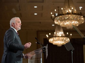 General Motors President Stephen Carlisle is seen here speaking to the Canadian Club of Toronto in this November 2015 file photo.