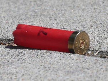 A shotgun shell is shown on the sidewalk on Arthur Rd. on Wednesday, June 1, 2016 in Windsor, ON. Police set up a multi-block perimeter surrounding a residence on Pillette Rd. where a gunman was eventually arrested without incident. (DAN JANISSE/The Windsor Star)