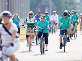 Participants take off on the 20km and 10km route of the Ride Don't Hide from the Children's Aid Society, Sunday, June 26, 2016. (DAX MELMER/The Windsor Star)