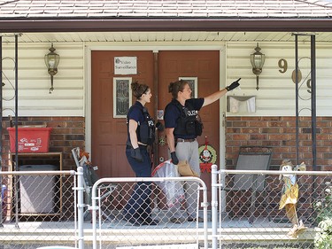 A Windsor police forensic identification officers are shown at a residence in the 900 block of Pillette Rd. on Wednesday, June 1, 2016 in Windsor, ON. Police set up a multi-block perimeter surrounding a residence where a gunman was eventually arrested without incident. (DAN JANISSE/The Windsor Star)