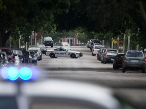 Windsor police close down the 900 and 1000 block of Monmouth Rd. after a shooting outside the Tim Hortons at Wyandotte St. East and Walker Rd. after a shooting, Wednesday, June 22, 2016. The assailant is still at large. (DAX MELMER/The Windsor Star)