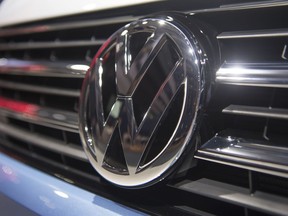 A VW-logo photographed  on aVW transporter T6 Business at a car exhibition in the context of the annual general meeting of Volkswagen AG in Hannover, Germany,  Wednesday June 22, 2016. (Nigel Treblin/dpa via AP) ORG XMIT: XHAN118